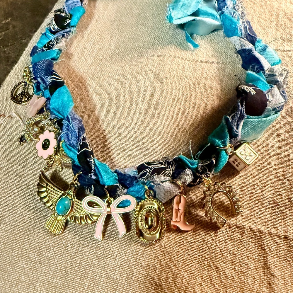 Brand new. Never worn. Bandana Bohemian Charm Necklace with Blue Accents